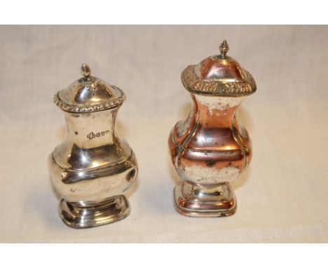 An Edward VII silver baluster-shaped pepperette, Chester marks 1903 and one other similar Sheffield-plate pepperette (2)