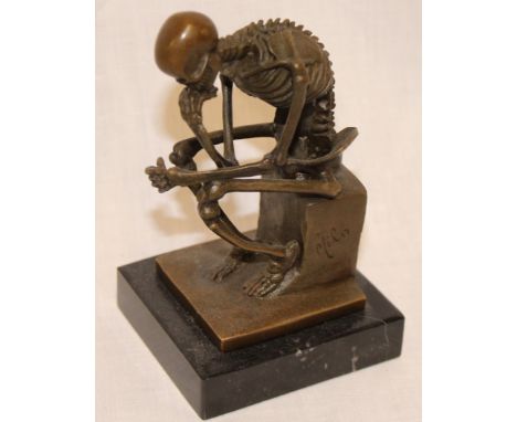 A modern French bronze figure of a seated skeleton after Milo on black marble base, 6" high