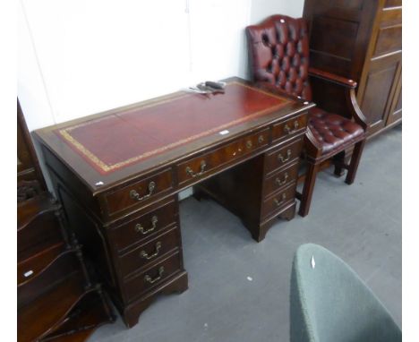 MAHOGANY ENGLISH PEDESTAL DECK, WITH INSET LEATHER TOP AND A RED LEATHER BUTTON UPHOLSTERED OPEN ARMCHAIR (2) 