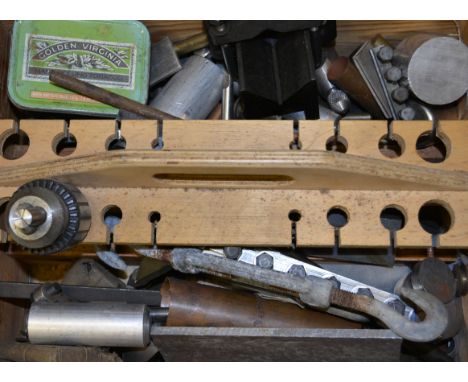 Work box, containing tools and raw materials.