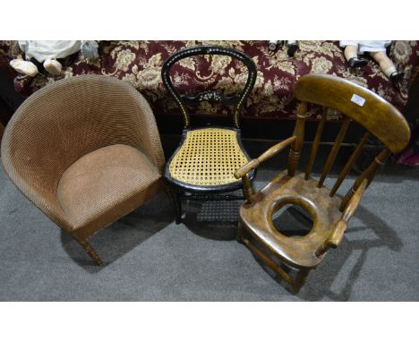 Victorian black lacquered child's chair, mother of pearl inlay, cane seat, 63cm, a child's commode chair and a mesh chair (3)