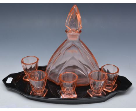 Tinted glass liquor set, Art Deco style comprising decanter, 22cm, five glasses on a coloured tray (7).