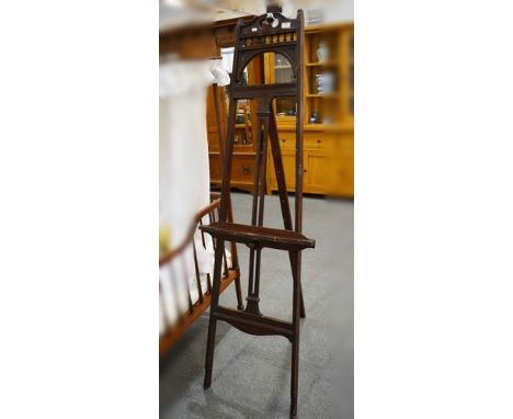 Edwardian stained wood easel, height 175cm.