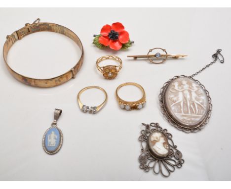 Silver gilt hinged bangle, three dress rings, two with stones missing, cameo brooch and other costume jewellery.