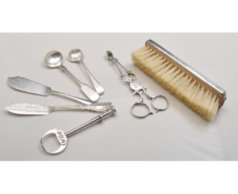 Silver backed hand mirror, Birmingham 1936, engine turned, 28cm, a matching clothes brush, a pair of Georgian silver sugar sc
