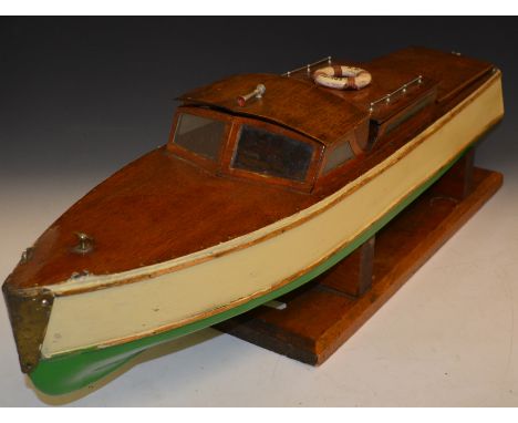 Vintage type Sprite speed boat, with early radio and ED comp special engine on stand.