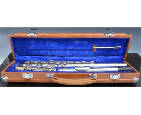 Clarinet, Lark 4001, cased and a plated flute by Lark, cased (2).