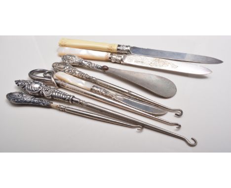 Edwardian bread knife, silver blade, Sheffield 1902, carved ivory handle, silver handled button hooks, shoe horns etc.