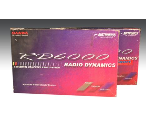 Two Sanwa 6 channel computer R/C transmitters, boxed, one with receiver, as new.