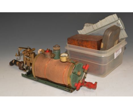 Part built stationary steam engine, and plastic box containing engineering tools.