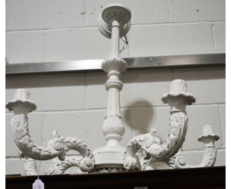 A white painted five light chandelier, French, carved and scrolled decoration, 76cm drop.