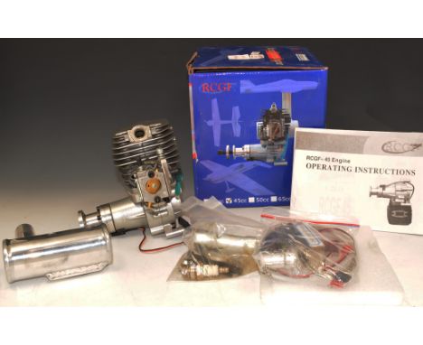 RCGF 26cc 2 stroke petrol engine, new in box.