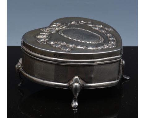 Edwardian silver heart shape ring box, Birmingham 1906, decorated with festoons and ribbon tie, engraved monogram, width 7cm.