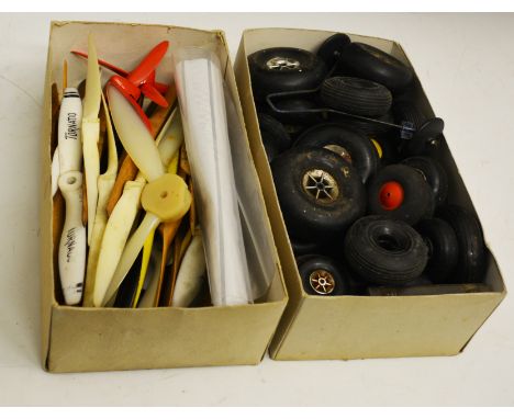 Box containing wheels, props, plains and control line handles etc.