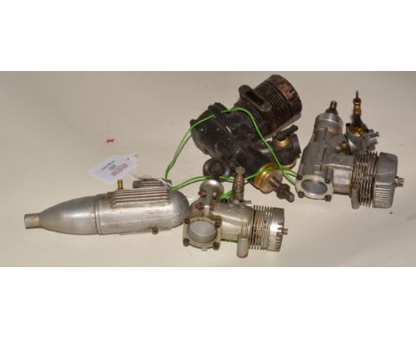 Three R/C glow engines for spares or repair.