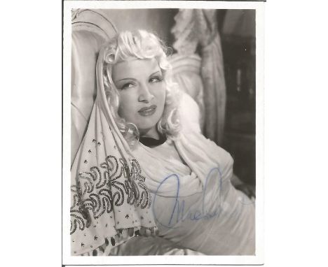 Actress Mae West signed 3x2 vintage black and white photo, with unsigned 10x8 black and white photo. Mae West was an American