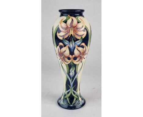 A Moorcoft 'Sweet Lily' vase, dated 2010, of high-shouldered baluster form, printed and painted marks, 27.5cm high

In good, 