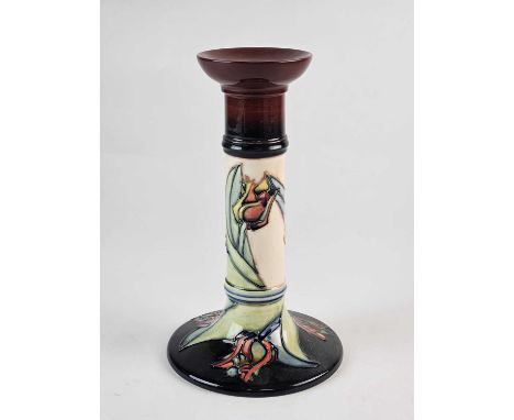 A Moorcroft 'Red Tulip' candlestick, dated 1994, impressed and painted marks, 21cm high

A few minor lines of crazing. Good c