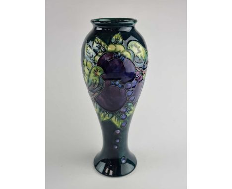 A Moorcroft 'Blue Finches' vase, dated 1994, designed by Sally Tuffin, impressed and painted marks, 28cm high. Boxed.
Provena