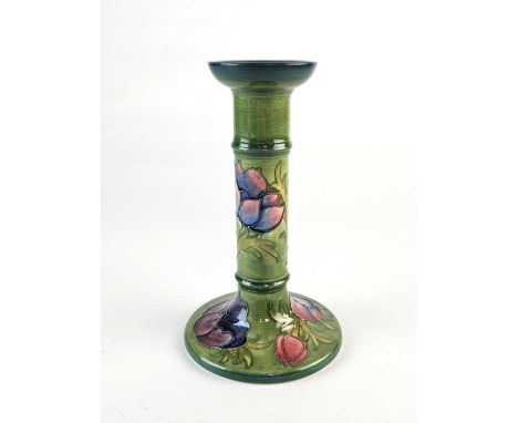 A Moorcroft 'Anemone' candlestick, dated 1991, typically tubelined against a green shaded ground, painted and impressed marks