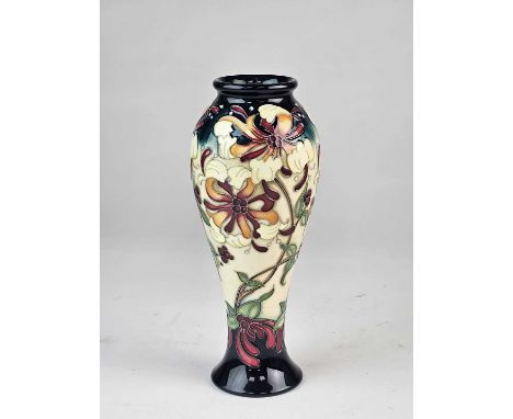 A Moorcroft 'Honeysuckle Haven' vase designed by Rachel Bishop, dated 2015, impressed and painted marks, 21cm high

Good firs