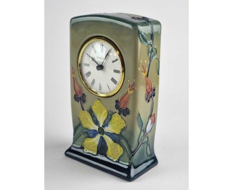 A Moorcroft 'Hypericum' mantel clock, dated 1995, painted and impressed marks, 15.5cm high. Boxed with original instructions.