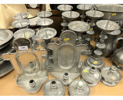 A collection of Giorgio Tabellini La Bottega del Petro pewter candle holders including three pairs of pricket candlesticks, 3