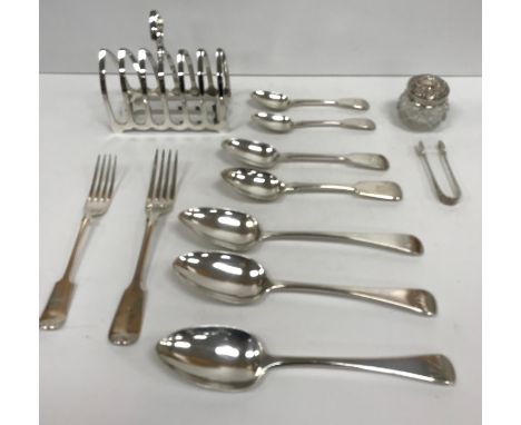 A George V silver six section toast rack of plain arched form (by George Howson for Harrison Brothers & Howson, Sheffield 191