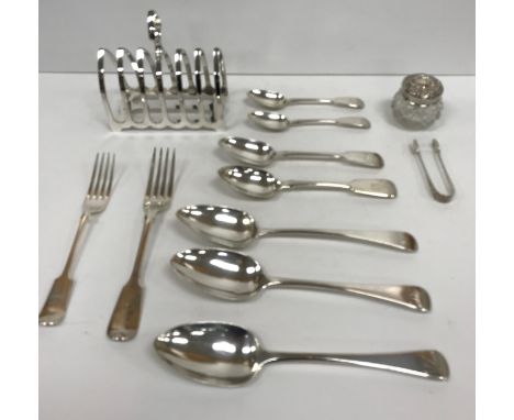 A George V silver six section toast rack of plain arched form (by George Howson for Harrison Brothers & Howson, Sheffield 191