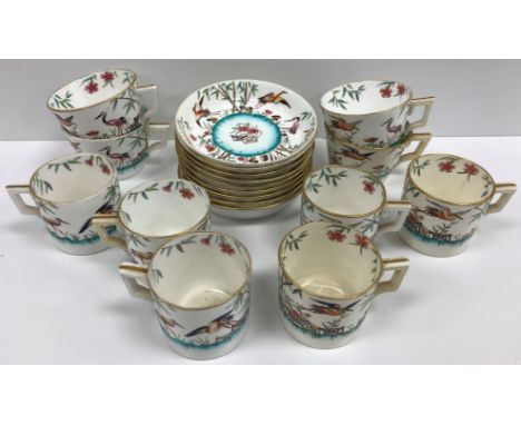 A Mintons transfer decorated and over coloured part coffee set with crane decoration (pattern 93898) comprising six cans, fou