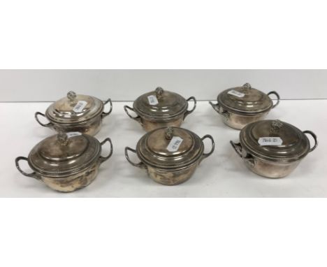 A set of six French .950 silver two-handled cups and covers with fruit finials by G Falkenberg,  20.19 oz, 10.5 cm wide inclu