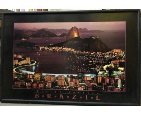A collection of various frames (6) of varying sizes and a print of "Rio de Janeiro" with electronic  light at back