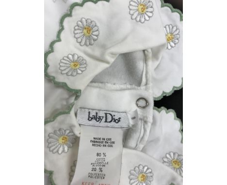 Various Baby Dior baby clothes to include two Size 6 baby grows with daisy patterned yokes, a yellow velour Size 3 baby grow 