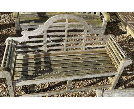 A Lutyens design teak garden bench seat, 166 cm wide