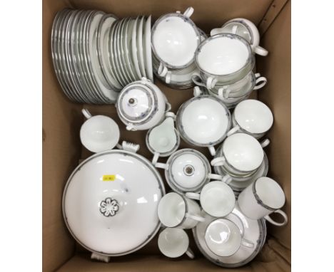 A Minton "Haddon Hall" part tea set comprising six cups and saucers, five side plates, one cake plate, one milk jug, one suga