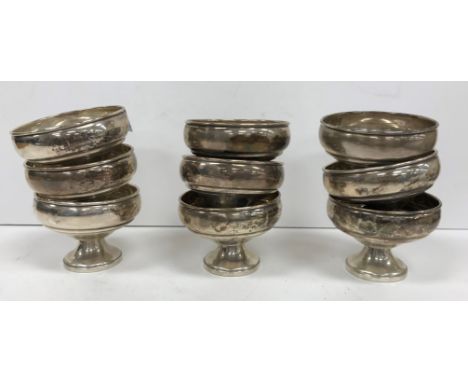 A set of ten Revere sterling silver pedestal bowls stamped to base "Revere Silversmiths Inc sterling reinforced with cement",