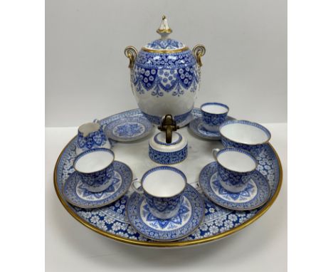 A late Victorian Copeland Spode blue and white and gilt decorated coffee set with central pot on a revolving circular stand 4