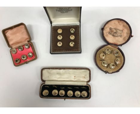 Two sets of six early 20th Century photographic print buttons, each depicting a young lady in early 20th Century fashion, hou