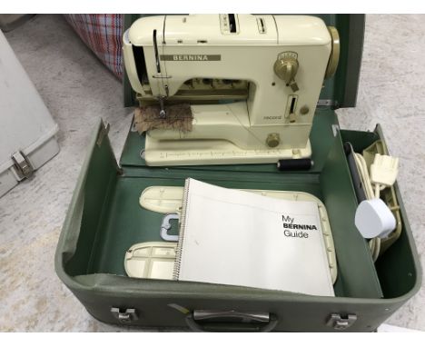 A Bernina 730 "Record" electric sewing machine originally purchased in 1968, together with paperwork, manual, various sewing 