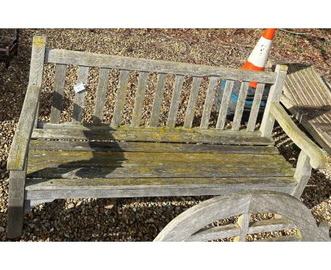 A teak slatted garden bench seat, 183 cm wide