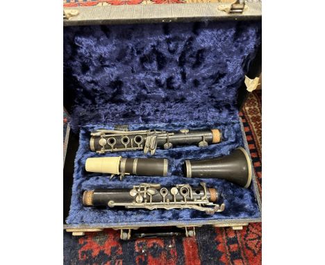 An F Buisson Dallas 90 clarinet with hard case and a vintage mandolin (un-named)