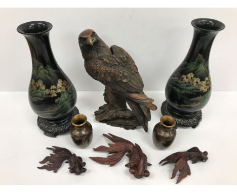 A box containing a collection of Oriental artifacts including a hardstone and jade flower ornament 36 cm high, a jade koro 9.