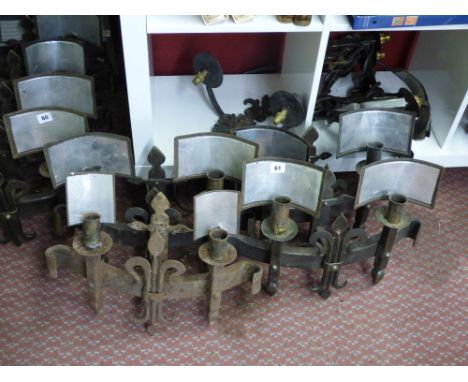 SET OF FOUR WROUGHT IRON FLEUR DE LYS DESIGN TWIN LIGHT WALL APPLIQUES WITH REFLECTORS CONVERTED FOR ELECTRICITY