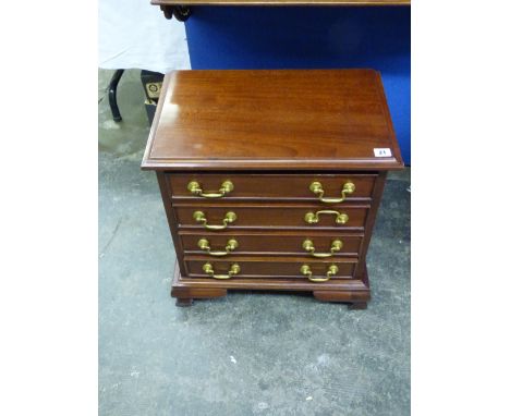 REPRODUCTION GEORGE III STYLE MAHOGANY SMALL CHEST OF FOUR DRAWERS ON OGEE BRACKET FEET