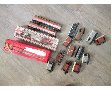 A boxed Hornby 00 gauge operating crane, boxed Lima example and fourteen unboxed items of rolling stock