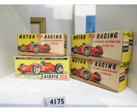 Four boxed Airfix Motor Racing 1:32 scale electric cars