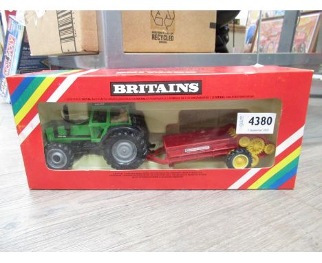 A boxed diecast Britains Deutz DX110 tractor and manure spreader 
