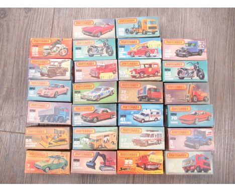 A collection of twenty six boxed Matchbox 1-75 Series diecast vehicles to inlude 16 Pontiac, 26 Cable Truck, 42 '57 T-Bird, 3