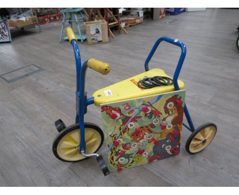 A Raleigh childs tricycle and a hoop toss game (2)