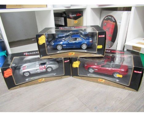 Three boxed Maisto Premier Edition 1:18 scale diecast cars to include Mercedes-Benz SL, Mercedes-Benz SL Class convertible an